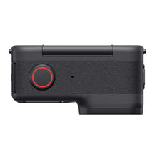 Action camera side view with large textured panel and circular red power button