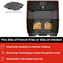 Black air fryer with clear side window and non-stick cooking tray