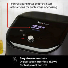 Black air fryer with digital touchscreen controls and illuminated menu display
