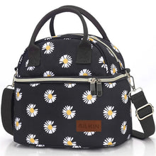 Insulated lunch bag with daisy pattern, top handle and adjustable shoulder strap