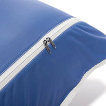 Blue inflatable cushion with zipper along the white piping edge