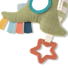 Olive green dino toy with ribbon strips and orange star teether clip