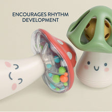 Green and red mushroom musical rattles with clear compartments of colorful beads