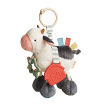 Plush cow activity toy with red link teether and dangling fabric tags