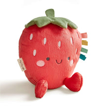 Plush strawberry plush with green leaf, red body, smiling face, sensory ribbon tags