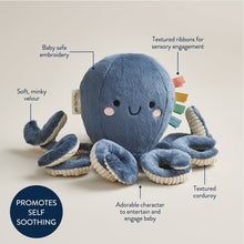 Blue plush octopus with felt ribbons, corded tentacles, and soft velvety body.