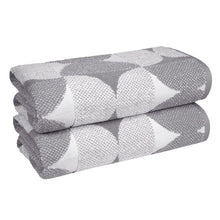 Gray bath towel 2-piece set, stacked view, geometric heart motif on woven fabric