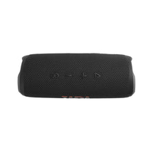 Black JBL Flip 6 speaker rear grille with small indicator icons and buttons.