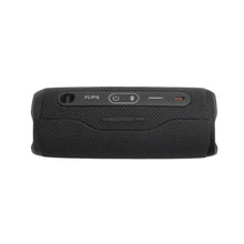 Black JBL Flip 6 control panel with power, Bluetooth, and volume icons.