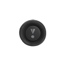 Close-up of the circular passive radiator on a black JBL Flip 6 speaker.
