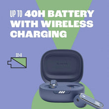 Black wireless earbuds resting in open charging case with charging contacts visible