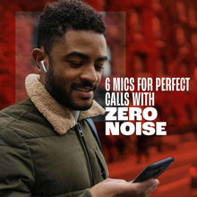 Man wearing black wireless earbuds in ear while looking at a smartphone