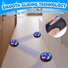 Glowing LED hover soccer ball toy near the floor in an indoor hallway