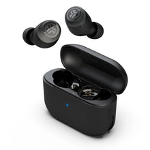 Black true wireless earbuds with open charging case, earbuds removed