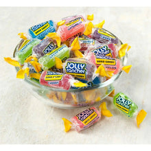 Assorted JOLLY RANCHER hard candy pieces in a clear bowl