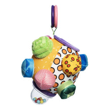 Sensory ball toy with colorful fabric lobes and dangling beaded container, hanging ring