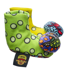 Sensory rattle socks with green and yellow plush, rounded toe rattles, sewn logo tag
