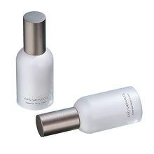 Essential Mool Cream bottles with white body and metallic silver caps