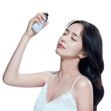 JUNGSAEMMOOL mist bottle spraying onto face of model