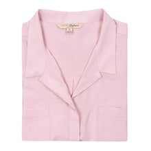 Pink blouse with pointed collar and front button placket, logo tag