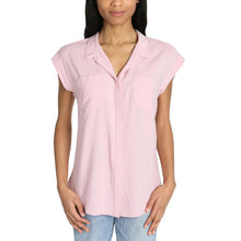 Pink button-front blouse with pointed collar and short sleeves