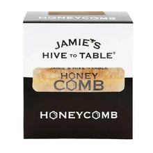 Honeycomb honey carton with clear window showing amber honeycomb slab