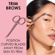Facial hair trimming scissors with curved blades held away from the skin