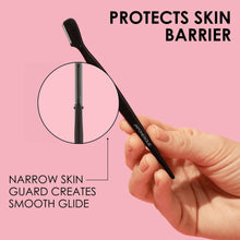 Brow touch up razor with narrow skin guard tip held in hand