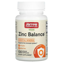 White bottle of vegan zinc supplement with orange circular support icon