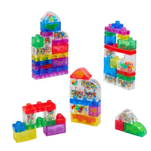 Colorful translucent interlocking block towers and small arches, assorted shapes