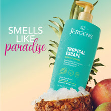 Teal Tropical Escape body lotion bottle with gold pump and tropical plants