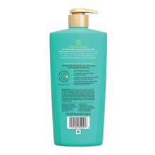Back view of teal body lotion bottle with product information label and barcode
