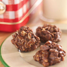 Chocolate-covered peanut butter balls on a plate