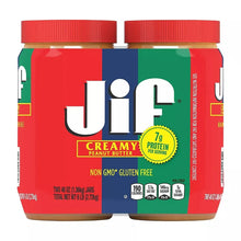 Creamy peanut butter jars with red lids and front label showing “Creamy Peanut Butter”