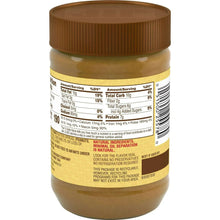 Jif Natural creamy peanut butter spread with honey jar, nutrition label on back