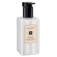 Jo Malone body and hand lotion bottle with black pump and white ribbed container.