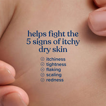 Baby skin with lotion being rubbed in, close-up