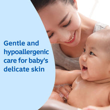 Parent holding baby in bath, smooth lather on skin
