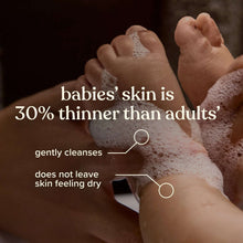 Foamy lather on baby feet, gently cleansing without leaving skin feeling dry