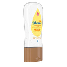Johnson's Baby body moisturizing oil gel bottle, yellow label on white with brown cap
