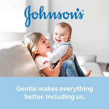 Johnson's baby bar soap ad with parent holding smiling baby on a couch