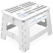 White folding step stool with slotted non-slip top and cutout side panels