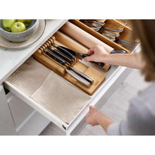 Bamboo drawer knife organizer insert with two rows of slots for knives