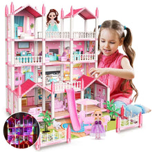 Pink dollhouse play set with room tiers, pink roofs, doll figures, and accessories