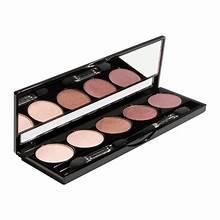 Opened eyeshadow palette with neutral and pink shades
