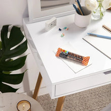 KIND snack bar, peanut butter dark chocolate, in orange wrapper.