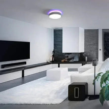 Round LED ceiling light fixture glowing purple