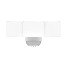 White LED motion security light faceplate with three panel covers and motion sensor
