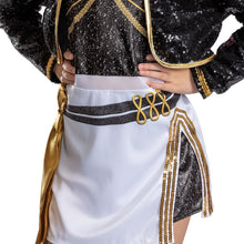 Close-up of costume: white skirt with gold rope trim and black sequin jacket sleeve