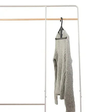 Kangaroo hanger holding a light gray knit garment with curved hook and bar shoulders